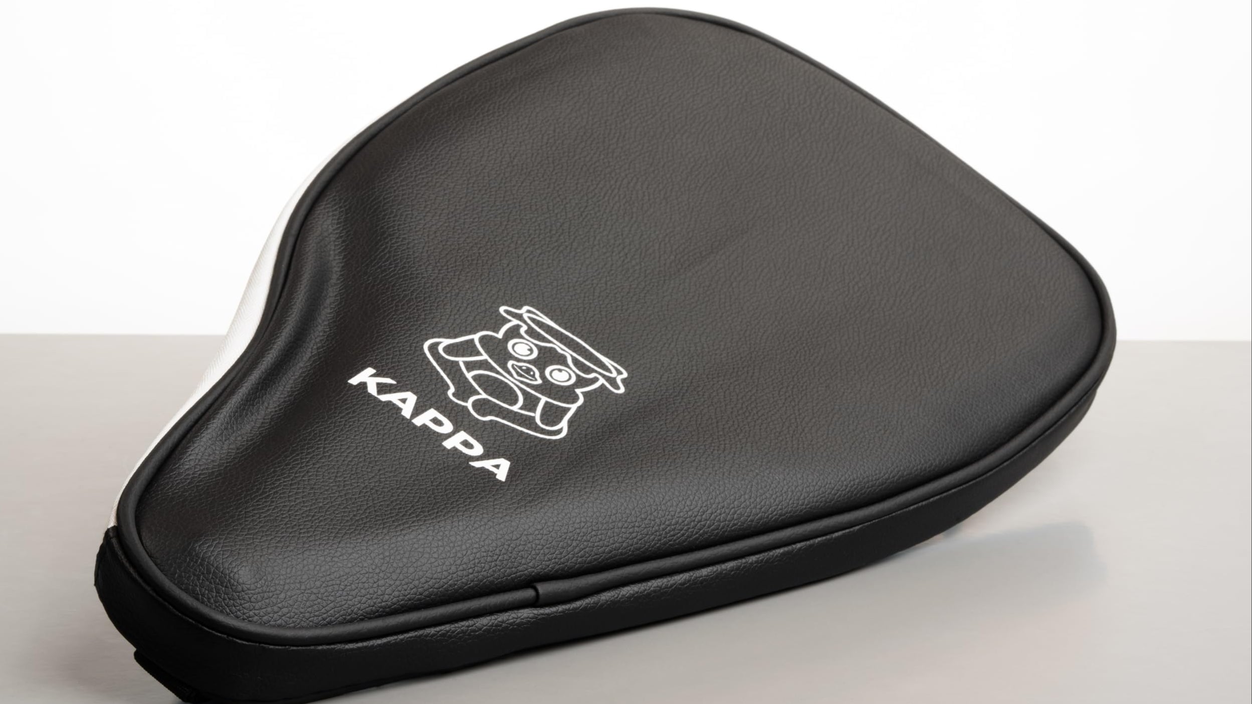 Black Kappa paddle case on a white background with text indicating it's included with purchase.